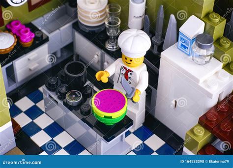 Lego Chef With Knife On Dark Dreen Background Editorial Photo