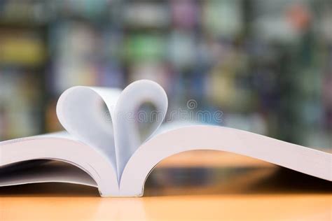 New Book Page In Heart Shape With Library Background Love In Va Stock