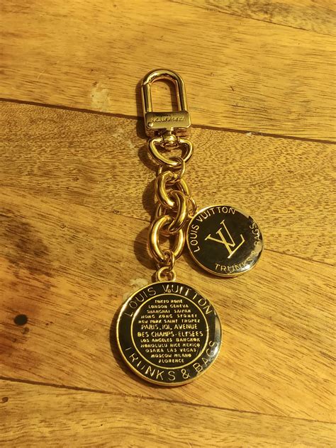 Louis Vuitton Louis Vuitton Black And Gold Bag Charms And Clasps Turned