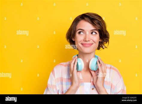 Portrait Of Attractive Cheerful Curious Girl Thinking Copy Space