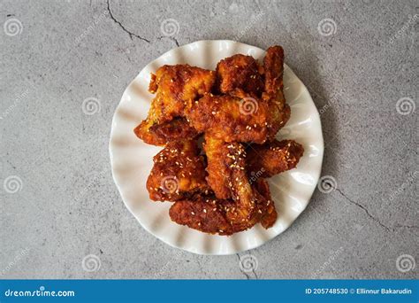 Deep Fried Chicken Wing With Hot And Spicy Sauce In Korean Style Or Asian Food Concept Stock