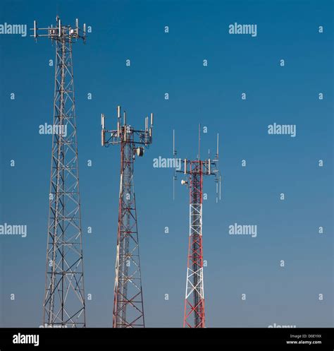 Three Communication Towers And Blue Sky Stock Photo Alamy