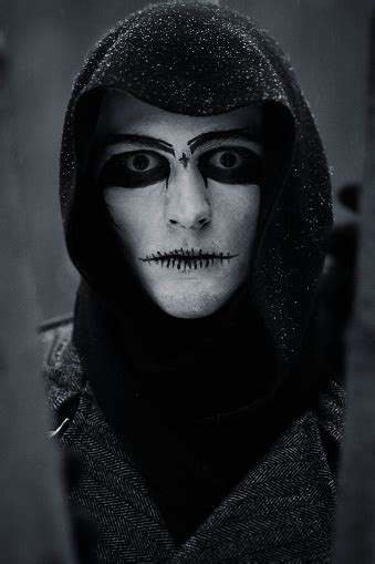 Mystical Interesting Handsome Guy In Black White Mask With Dark Stock