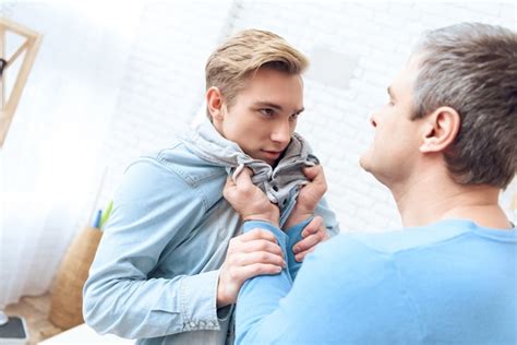 Premium Photo Father Intimidates Troubled Teenager