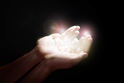 Man Stretching Hands Towards Light in Darkness, Closeup. Praying ... 