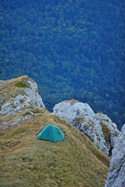 Tent On Mountain Cliff Edge In The Evening Stock Image Image 11241595