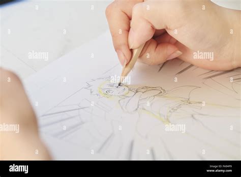 Japanese Manga artist working in the studio Stock Photo - Alamy