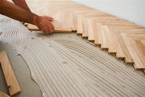 Comment Poser Et Coller Du Parquet Massif