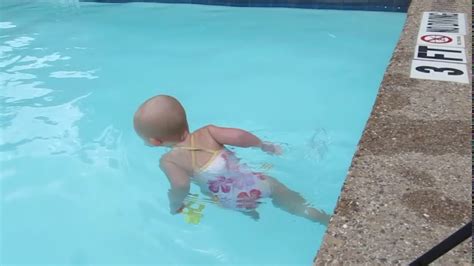 Baby Swims Across Pool YouTube