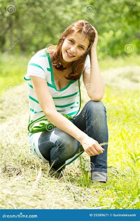 Girl Sitting On The Grass Stock Image Image 25589671