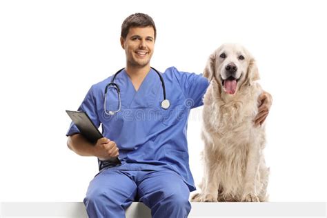 M Dico Veterinario Con Uniforme Azul Sentado En Un Panel Blanco Y