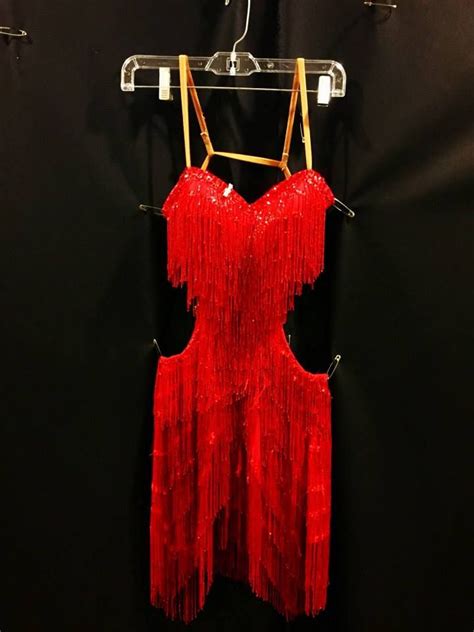 Who is wearing this costume on #DWTS' Era's Night?