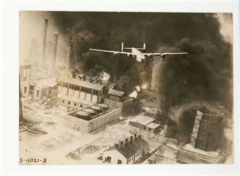 Plane Flying Over Burning City Smithsonian Institution