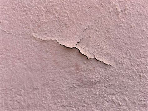 Premium Photo | Texture wall with cracks wall texture seamless