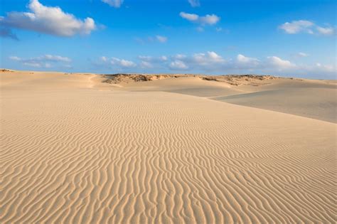 Premium Photo Sand At Beach Against Sky