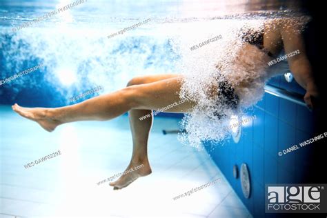 Woman Wearing Bikini Swimming In Pool Stock Photo Picture And Royalty