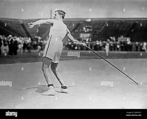 Olympic Track And Field Athlete Platt Adams Participating In A Javelin