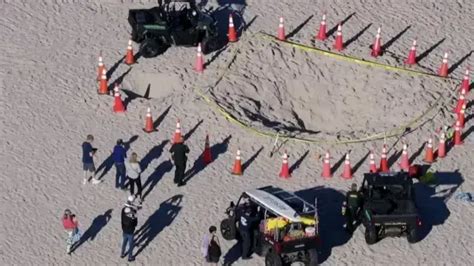 La Arena De Una Playa De Florida Se Traga A Dos Ni Os Que Cavaban Un