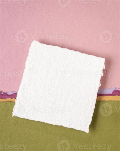 Small Sheet Of Blank White Khadi Rag Paper From India Against Abstract