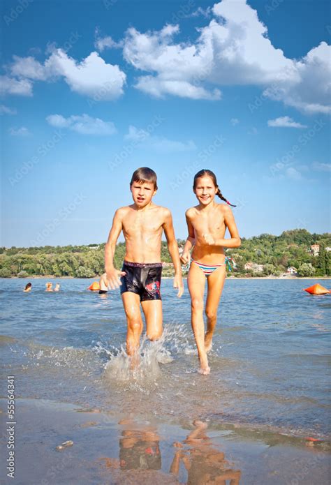 Boy and Girl on Strand beach in Novi Sad, Serbia. Stock Photo | Adobe Stock