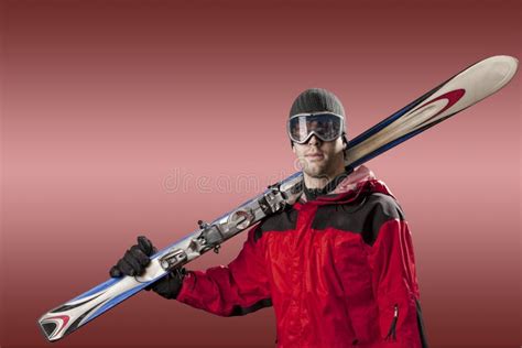 Skier Holding A Pair Of Skis Stock Photo Image Of Boarder Goggles