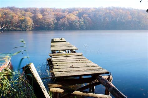 Old boat dock at the lake stock photo. Image of beautiful - 142439576