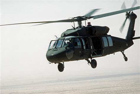 A Left Front View Of A U S Army Uh Black Hawk Helicopter In Flight