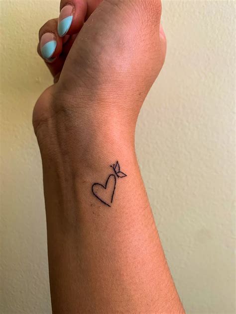 Heart And Butterfly Tattoo On The Wrist Small Tattoos For Women Small