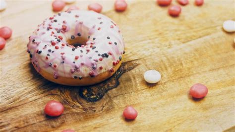 Cartoons Transformed Into Pink Donuts Decorated With Sweets Macro And