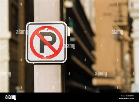 A Sign Shows Where You Cant Park Downtown Stock Photo Alamy
