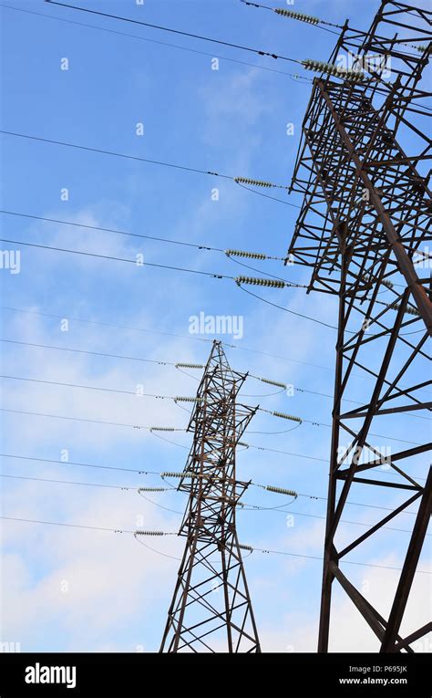 The Silhouette Of The Electricity Transmission Pylon In Daytime