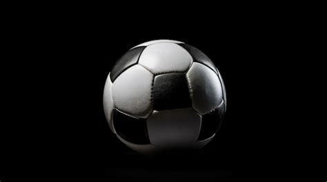 Premium AI Image A Soccer Ball With A White And Black Background