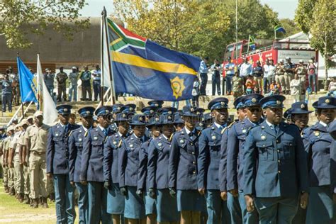 South African Police Services On Parade In The Arena With Saps Flag