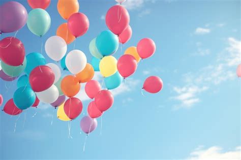 Premium Photo Colorful Balloons Floating In The Air Creating A