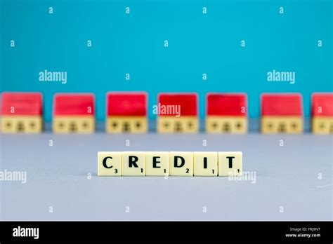 Figurine Wooden Houses On Blue Background Stock Photo Alamy