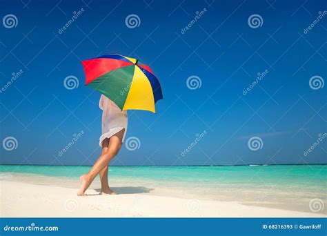 Girl With An Colorful Umbrella On The Sandy Beach Stock Image Image