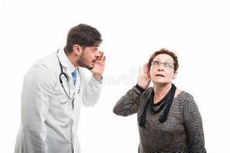 Patient Screaming While Doctor Drawing Blood Sample In Hospital Room