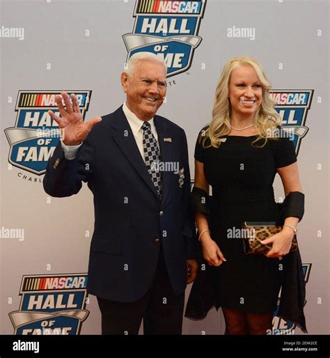 NASCAR Hall of Fame member Junior Johnson and his wife, Lisa Johnson walk the red carpet prior ...