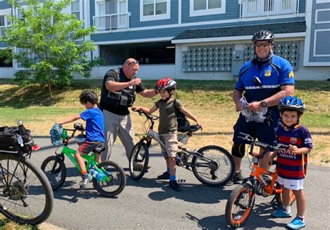 Breakstone White And Gluck And Everett Police Make Donations For Bike