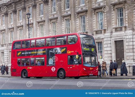 Modern Red Double Decker Bus In The Center Of London England Editorial