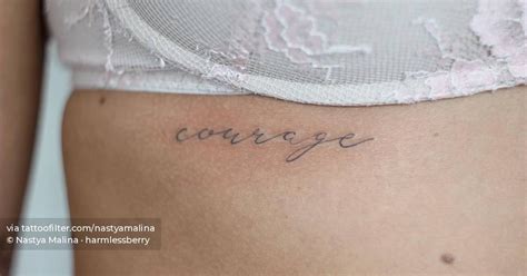 Courage Lettering Tattoo On The Rib