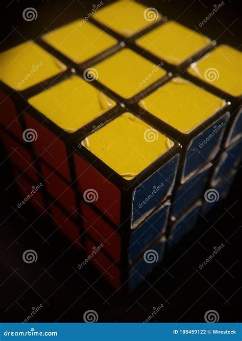 Vertical Shot Of Rubik S Cube Isolated On A Black Background Editorial