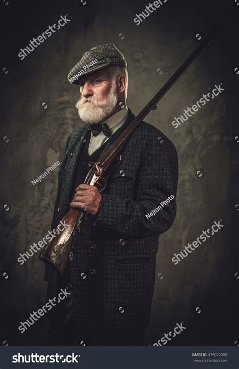 Senior Hunter Shotgun Traditional Shooting Clothing Stock Photo