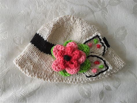 Ravelry Brimmed Hat In Ivory Colorful Flower Pattern By Susan Gardner