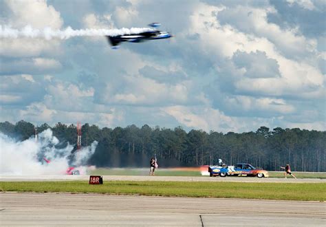 An MXS Aircraft Races The Flash Fire Jet Truck During PICRYL Public