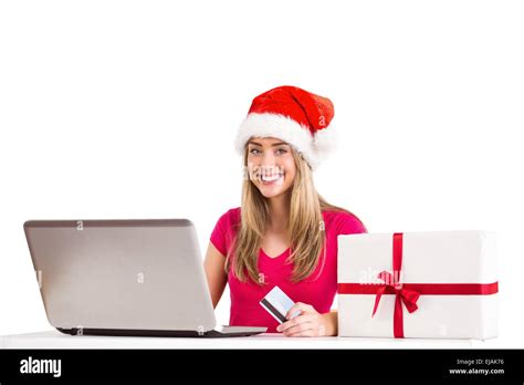 Festive Blonde Shopping Online With Laptop Stock Photo Alamy