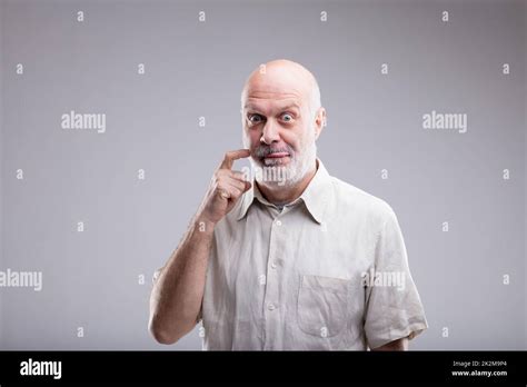 Gluttonous Bald Old Man Says Yummy Stock Photo Alamy