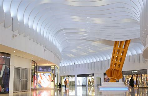 Sto wave-themed wall and ceiling design features at new shopping mall ...