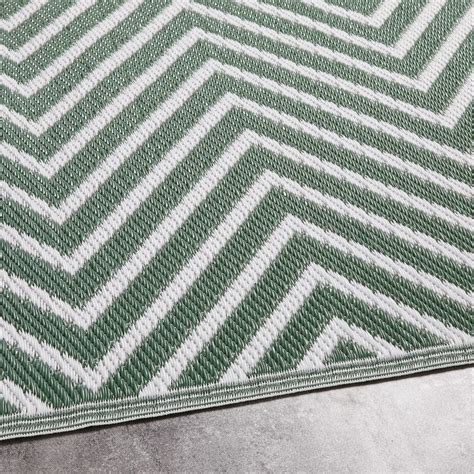 Tapis d extérieur vert motifs graphiques blancs 180x270 Zesti Maisons