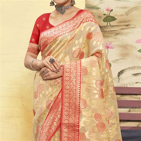 Chikoo Woven Poly Cotton Saree With Tassels